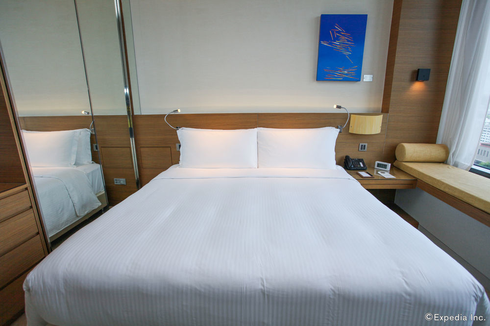 One Farrer Hotel Σιγκαπούρη Εξωτερικό φωτογραφία A bed